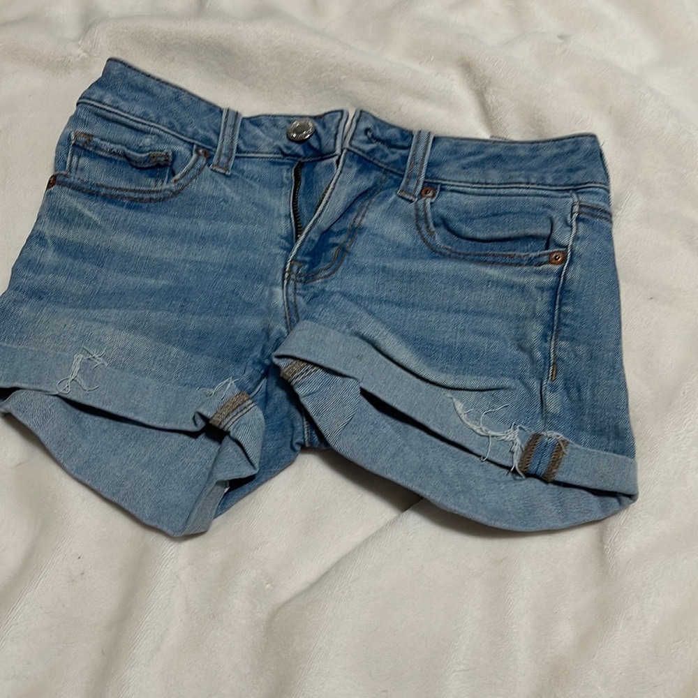 Light blue American Eagle jean shorts.